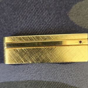 Dior Elegant Gold Money Clip with Purple Accent